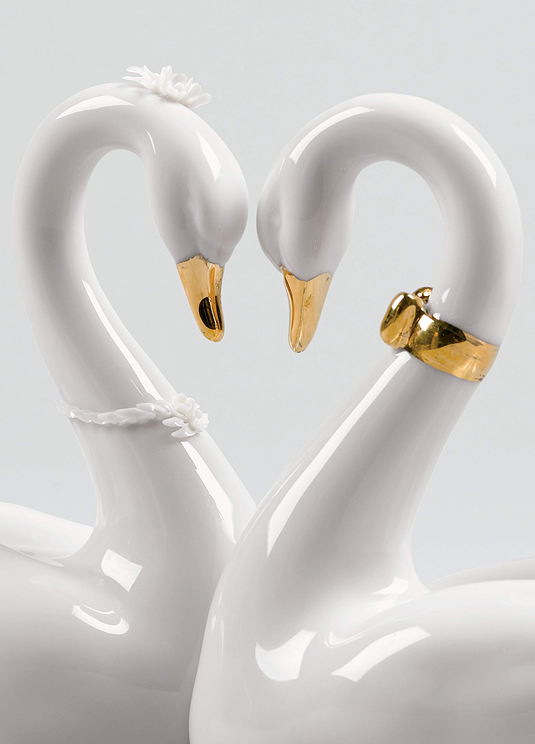 Lladró Cigni Amore Senza Fine figurina porcellana oro
