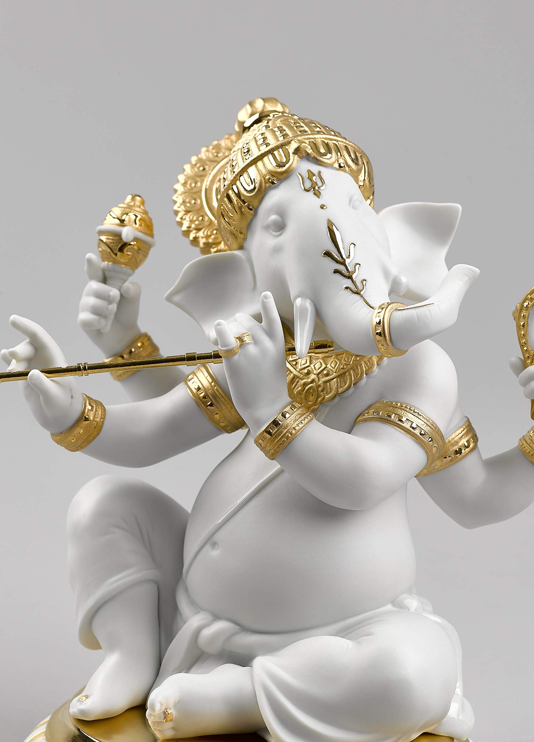 Lladró Ganesha con Bansuri figurina lustro oro porcellana